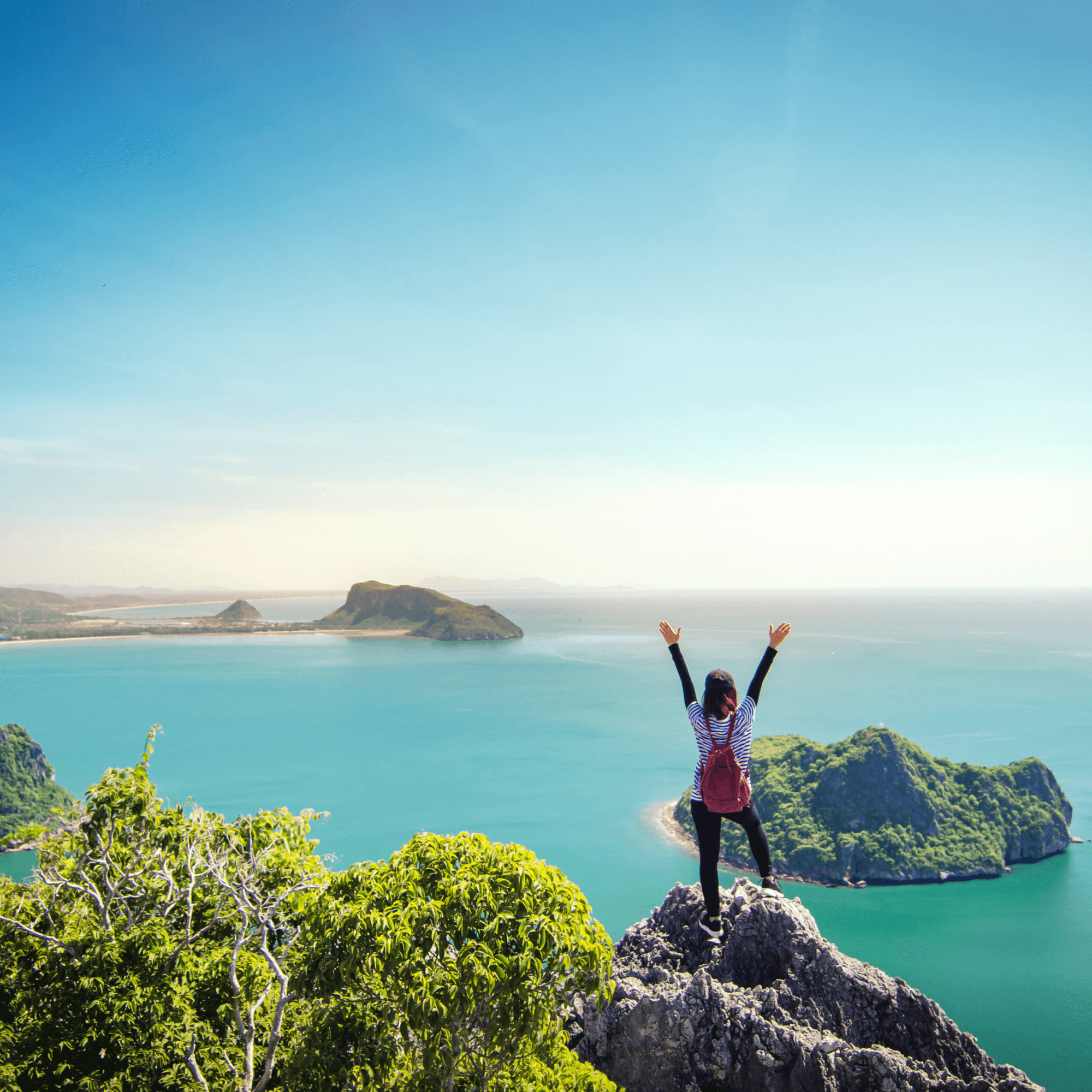 Traveller on top of a mountain